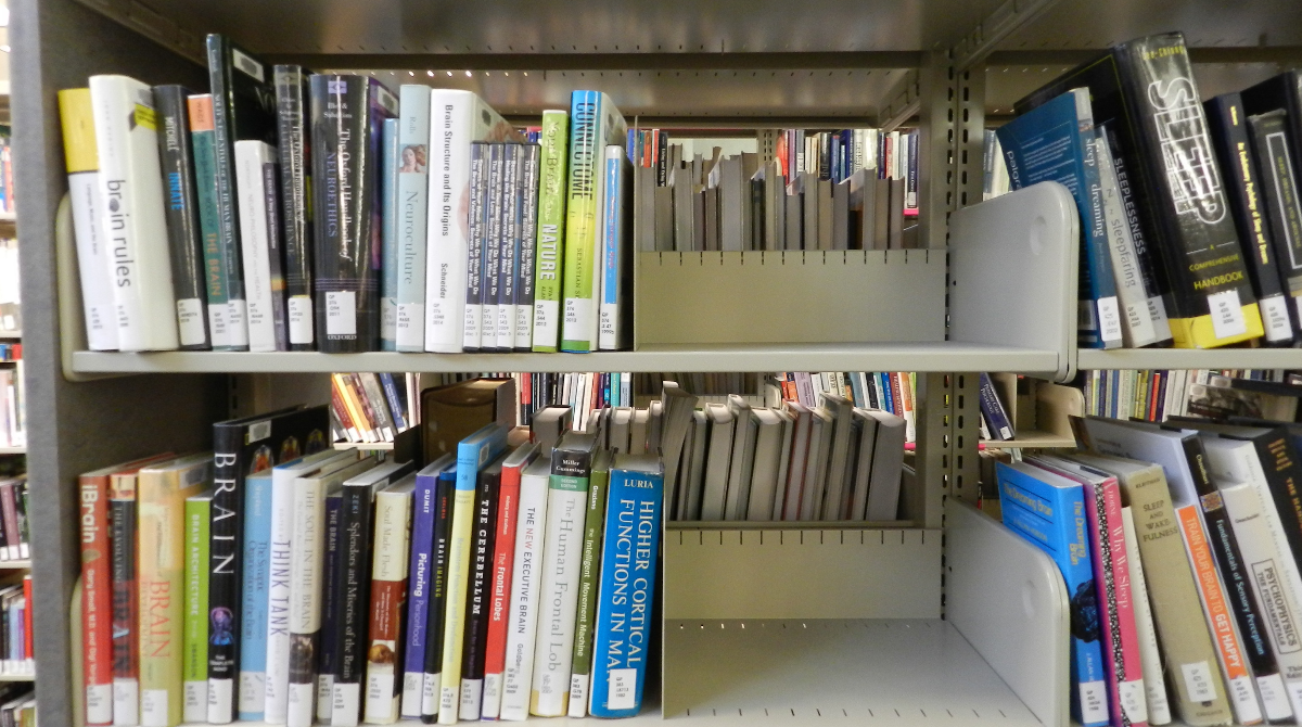 Picture of a library bookshelf that has been shifted so there is space to add more books in the future 